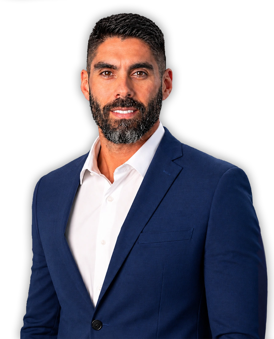 Chiropractor Rafael Sierra Smiling In Navy Suit
